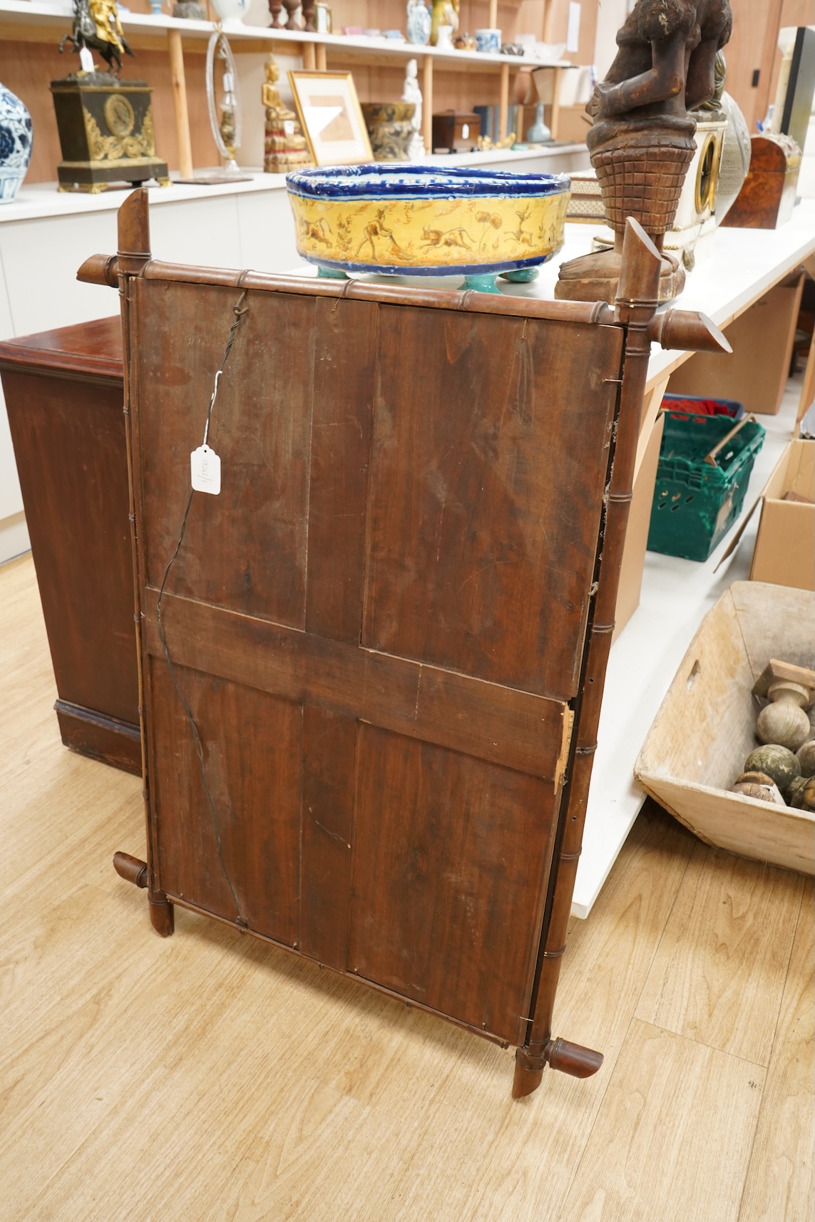 A large late 19th century faux bamboo mirror, 104cm high